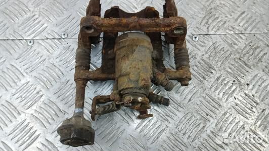 Суппорт тормозной задний правый opel astra J (NEA2