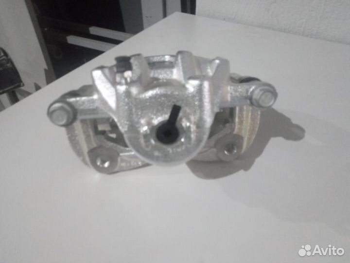 Суппорт передний левый Hyundai Solaris Kia Rio