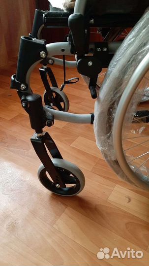 Инвалидная коляска новая