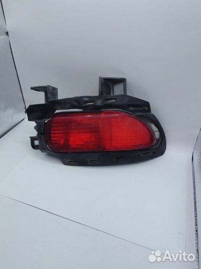 Фонарь противотуманный задний левый Opel Corsa