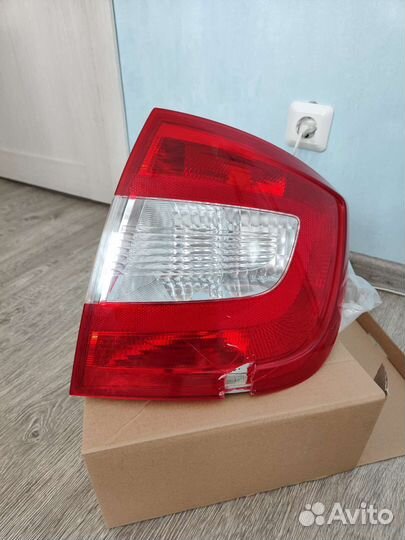 Фонарь задний Skoda Rapid