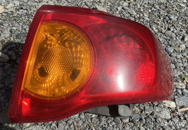 Фонарь правый задний в крыло Тойота Королла 150