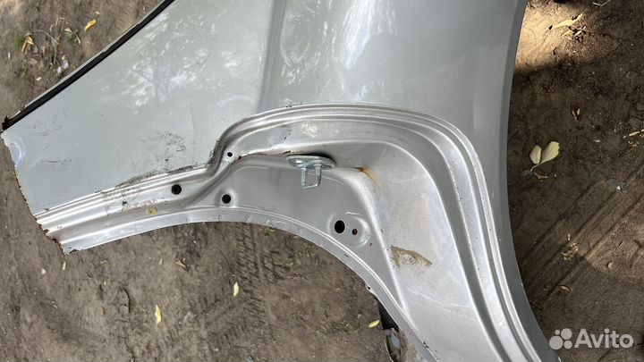 Крыло заднее левое toyota carina ed