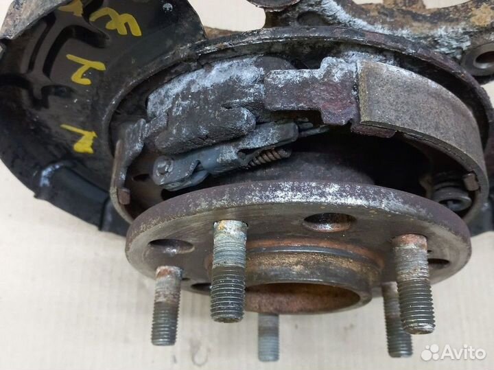 Кулак задний левый Kia Sportage 3 SL 2wd