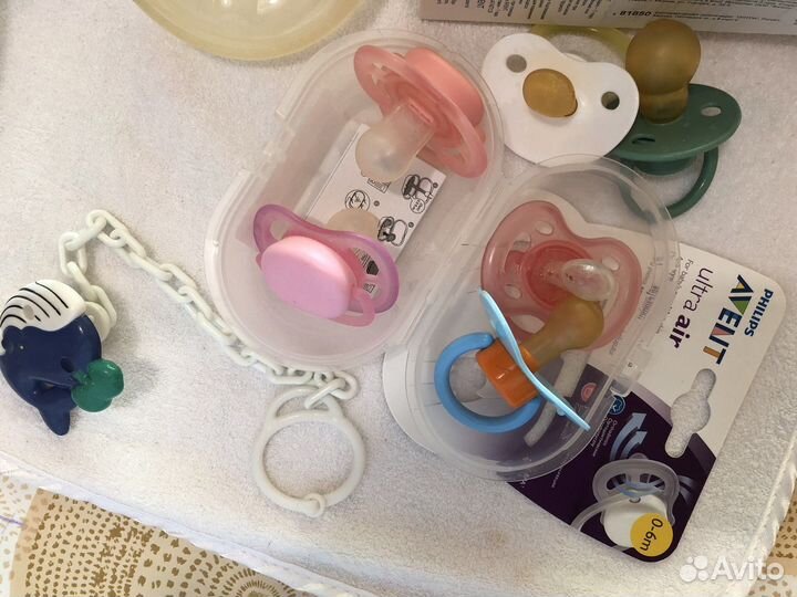 Молокоотсос ручной и др. товары для младенцев