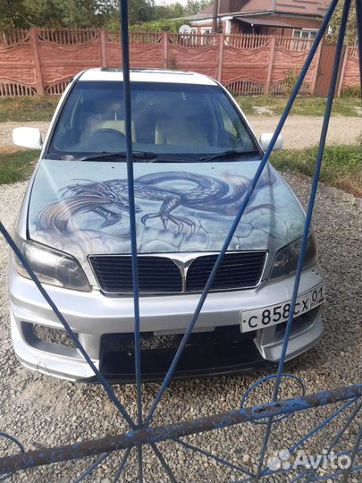 Капот мицубиси lancer седия