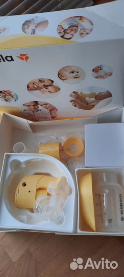 Молокоотсос medela электрический