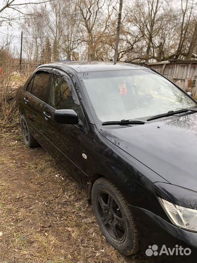 Mitsubishi Lancer 1.6 МТ, 2006, 150 000 км