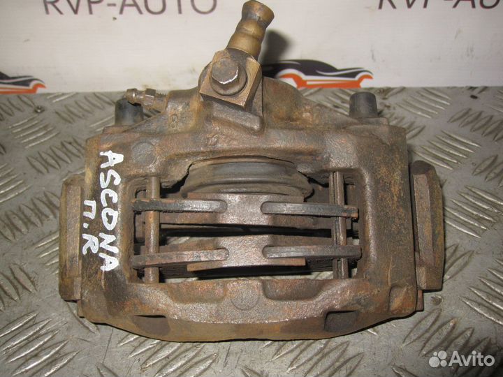 Суппорт тормозной передний Opel Ascona C 1981-1988