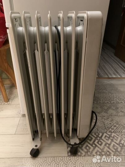 Масляный обогреватель delonghi