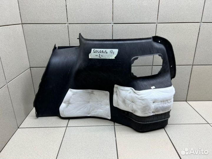 Обшивка багажника левая Hyundai Solaris седан G4FG