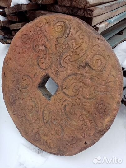 Каменный жернов