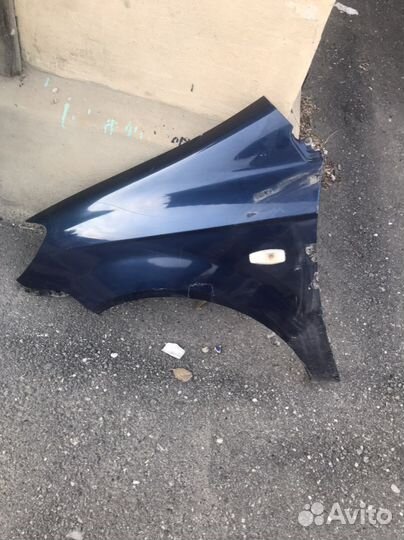 Крыло переднее левое