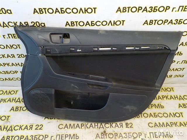 Обшивка двери передней правой Mitsubishi Lancer 1