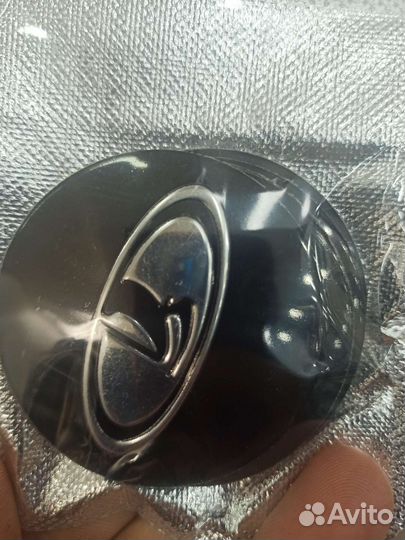 Наклейки на колпачки дисков