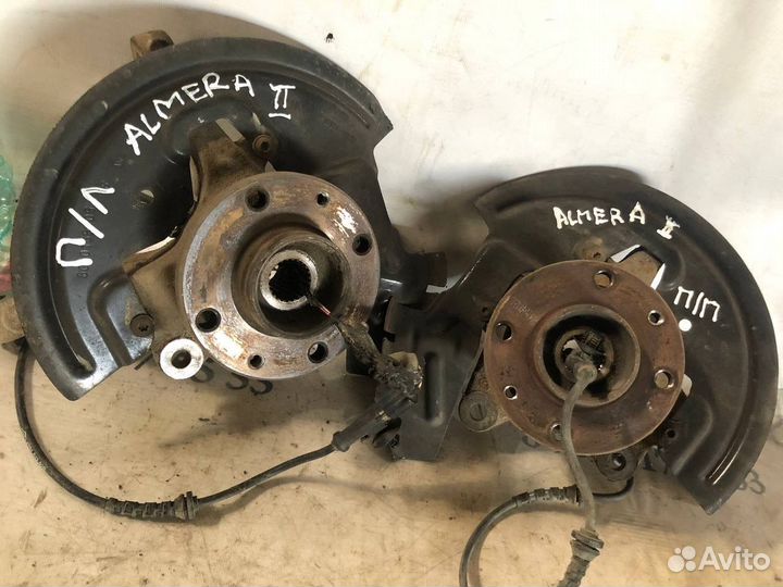 Кулак передний левый водительский Almera G15