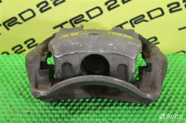 Суппорт тормозной передний правый Nissan Juke F15