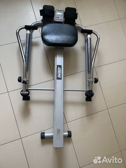 Гребной тренажер