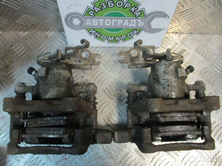 Суппорт тормозной задний L Volkswagen Caddy 3 07г