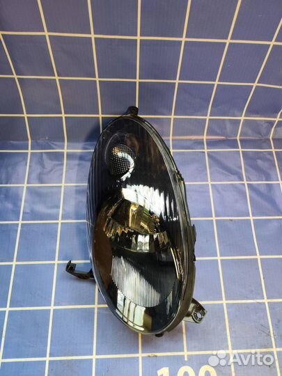 Фара левая Ниссан Микра 26060AX700