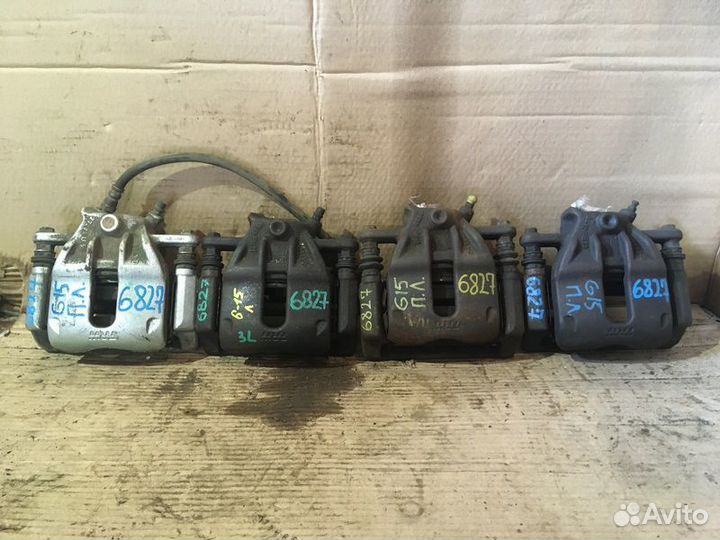 Суппорт передний левый Nissan Almera G15 1.6 k4m