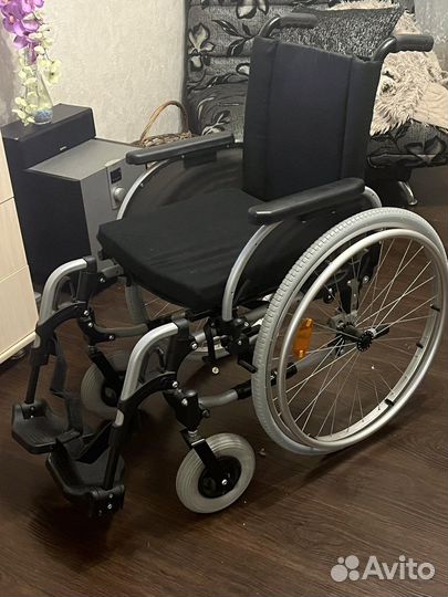 Инвалидная коляска