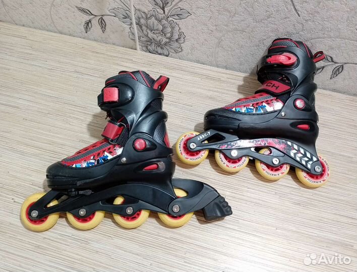 Роликовые коньки