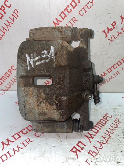 Суппорт тормозной передний правый Nissan X Trail