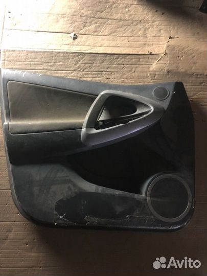 Обшивка двери передняя левая Toyota Rav4 XA30