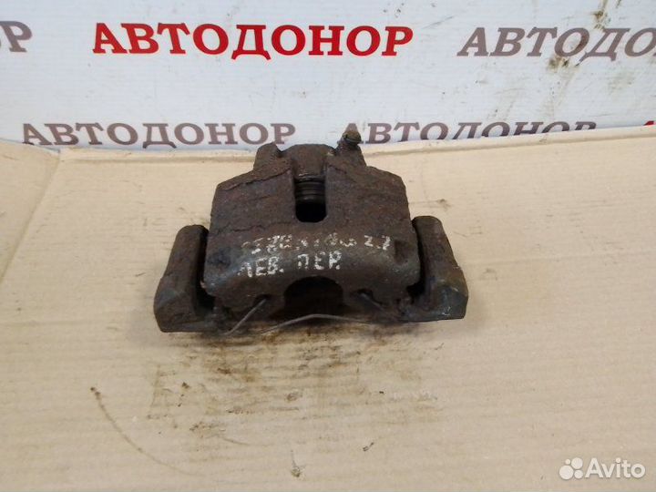 Суппорт тормозной передний левый Chrysler Sebring