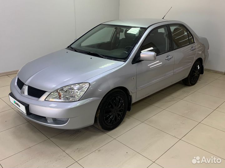 Mitsubishi Lancer 1.6 AT, 2009, 140 650 км