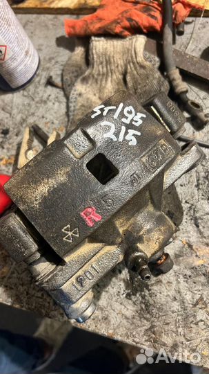 Суппорт задний caldina camry vista