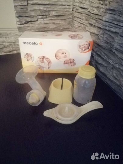 Молокоотсос medela ручной