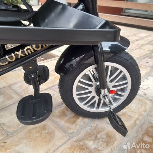 Трехколесный велосипед с ручкой