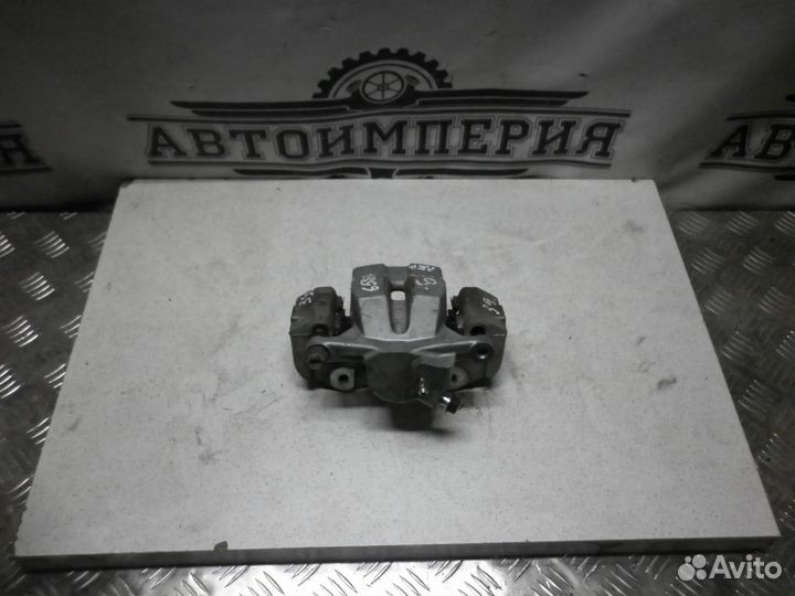 Суппорт тормозной Toyota Prius 40 Alpha / V / +