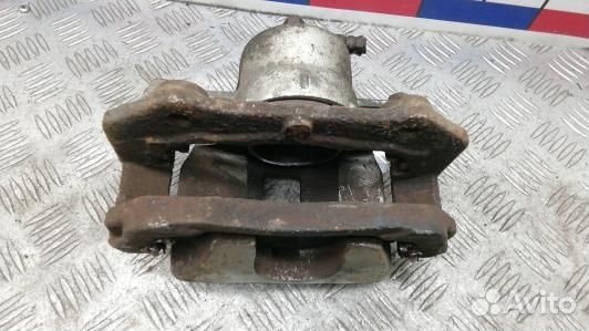 Суппорт тормозной передний левый suzuki grand vita