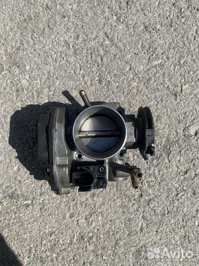 Дроссельная заслонка