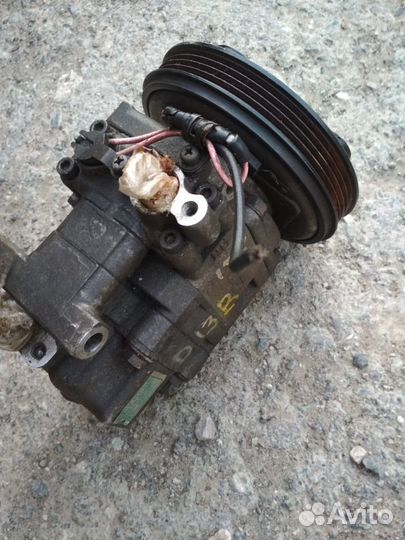 Компрессор кондиционера Honda Logo