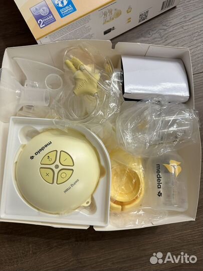 Молокоотсос medela swing maxi flex