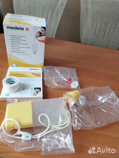Дополнительная система для кормления medela sns