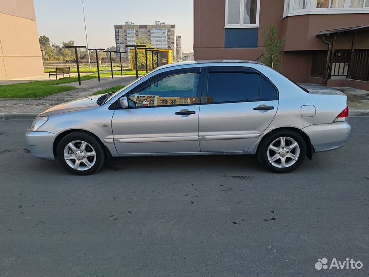 Mitsubishi Lancer 1.3 МТ, 2006, 210 000 км