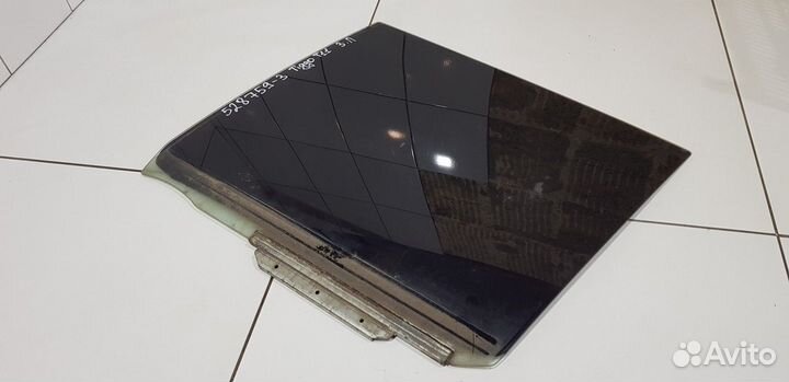 Стекло двери заднее левое