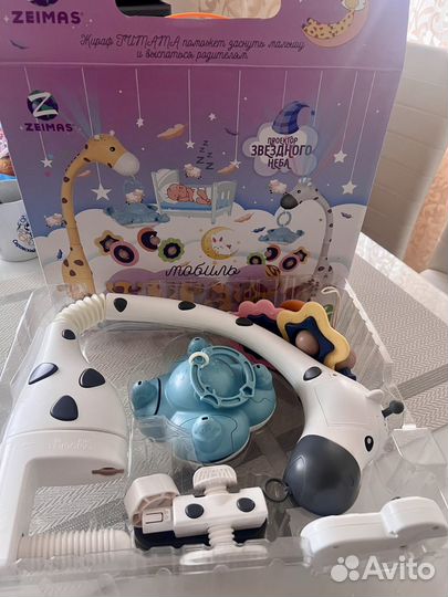 Музыкальный мобиль в кроватку Жираф с проектором