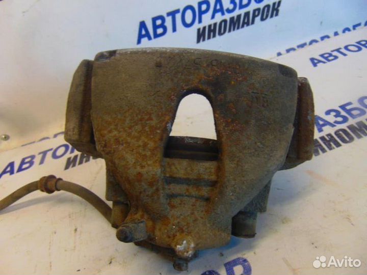 Суппорт тормозной передний левый Opel Astra H