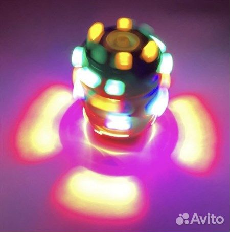 Заводная светящаяся и музыкальная юла