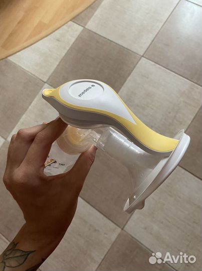Молокоотсос medela ручной