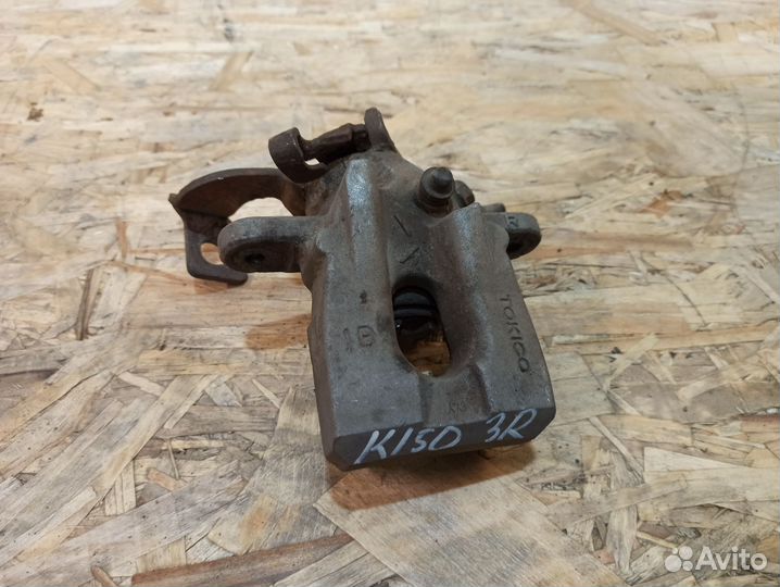 Суппорт задний правый Toyota Corolla E150