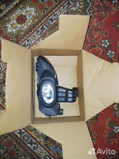 Противотуманка на Мазду 3. левая дорестайлинг