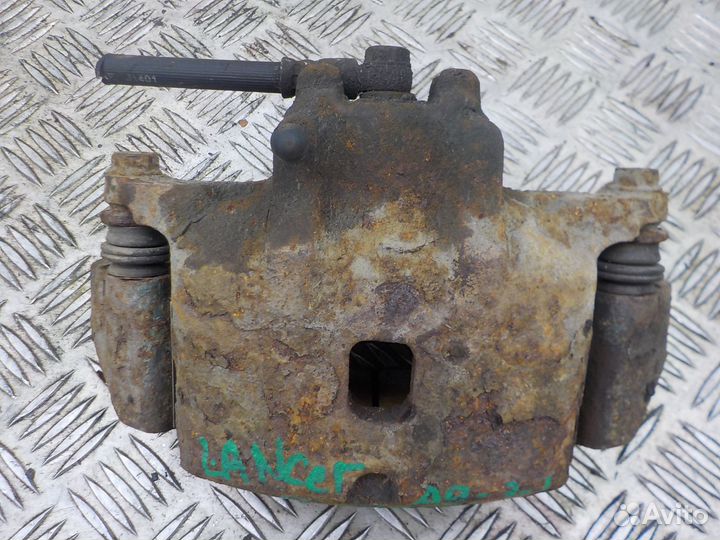 Суппорт тормозной передний правый Mitsubishi Lance