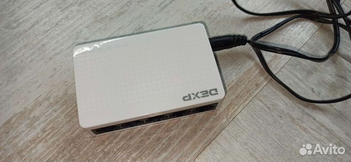 Коммутатор Dexp